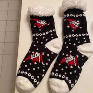 Gently worn fleece lined socks. Machine washable.